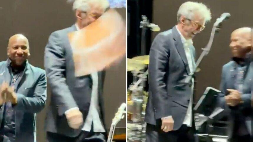 Eric Clapton detuvo su concierto en España tras ser golpeado con un vinilo