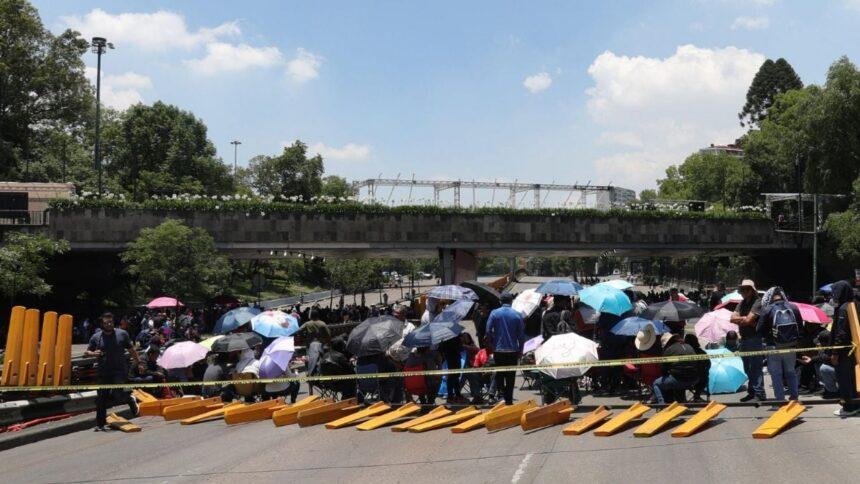 Transportistas suspenden movilización tras alcanzar acuerdo con Segob.