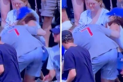 Aficionado de los Cachorros jalonea a joven para quitarle pelota de jonrón