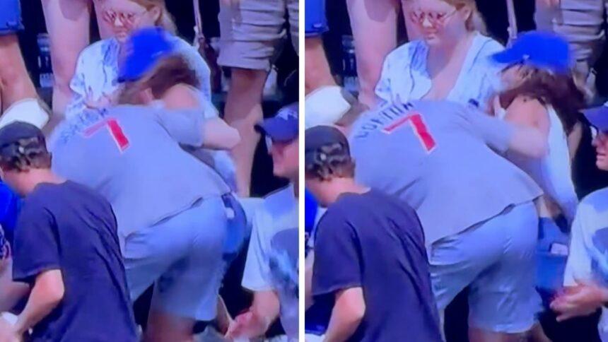 Aficionado de los Cachorros jalonea a joven para quitarle pelota de jonrón