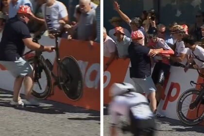 ciclista cae a 50 metros de la meta aficionado lo Ciclista cae a 50 metros de la meta, aficionado lo ayuda