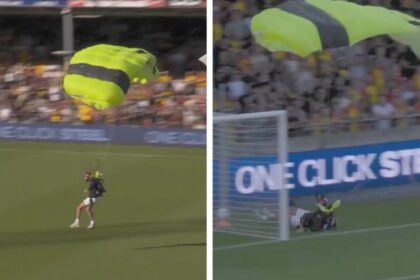 Paracaidista falla aterrizaje y choca contra valla en Eredivisie